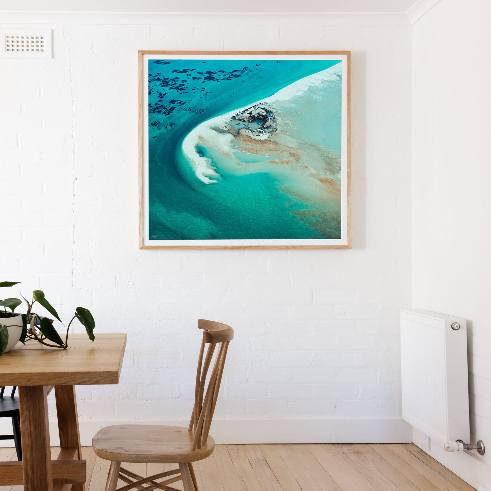 Square wall print framed in oak wooden fram Turqoise abstract aerial square wall art shark bay reef