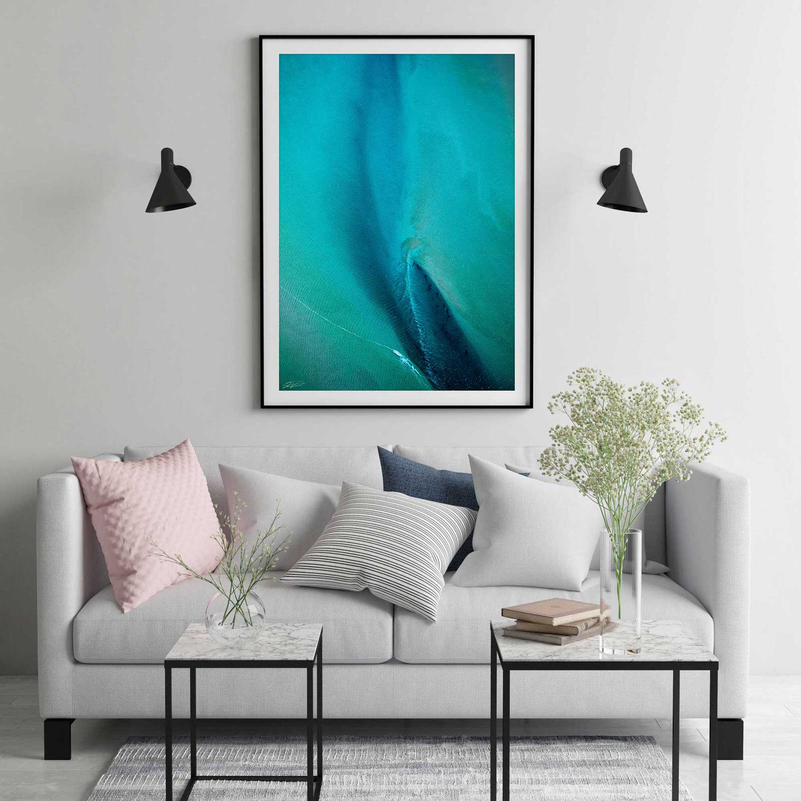 Blue and green abstract aerial wall art in black frame and modern styling