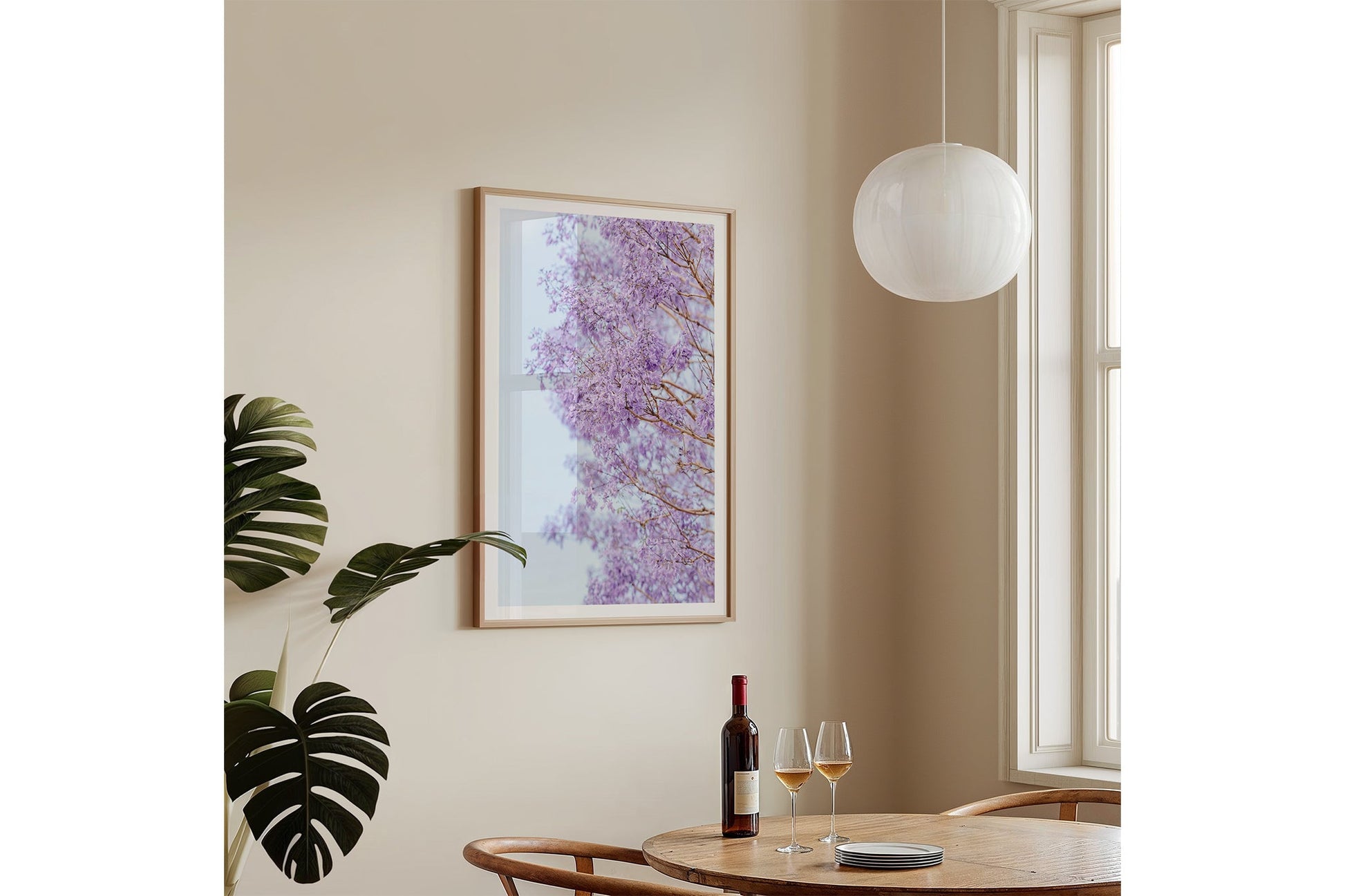 The Jacaranda Veil print shown framed in oak, hung on a wall.