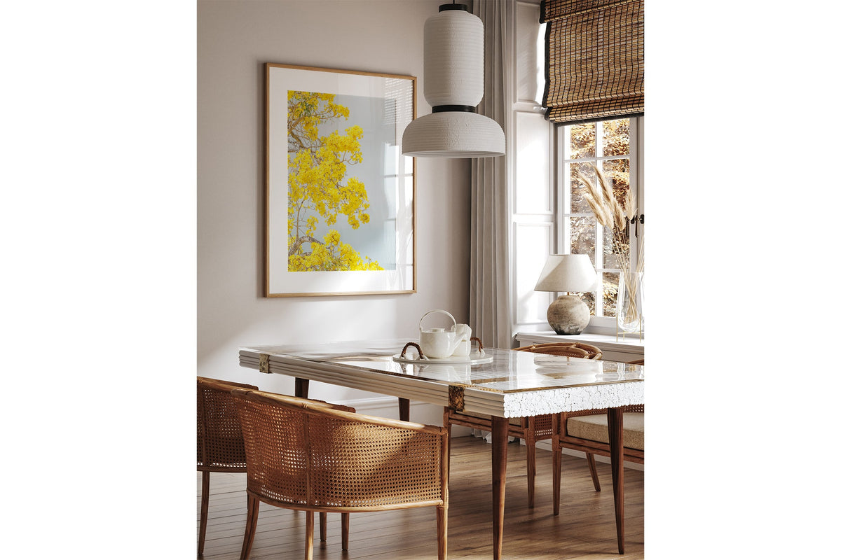 The Golden Trumpet print shown framed in oak.