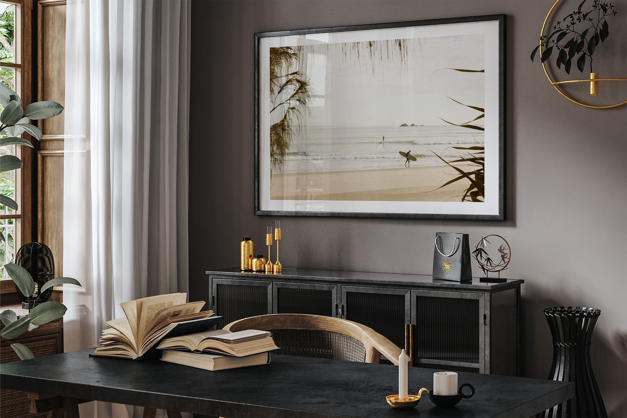 Byron Bay pastel surf print shown framed in black in a dark room.