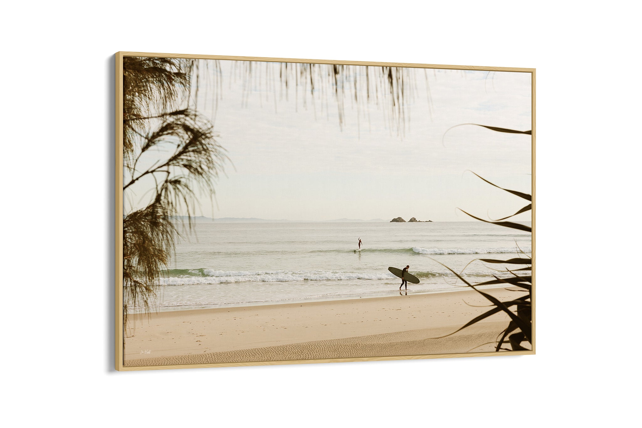 Byron Bay pastel surf print shown as an oak float frame canvas.