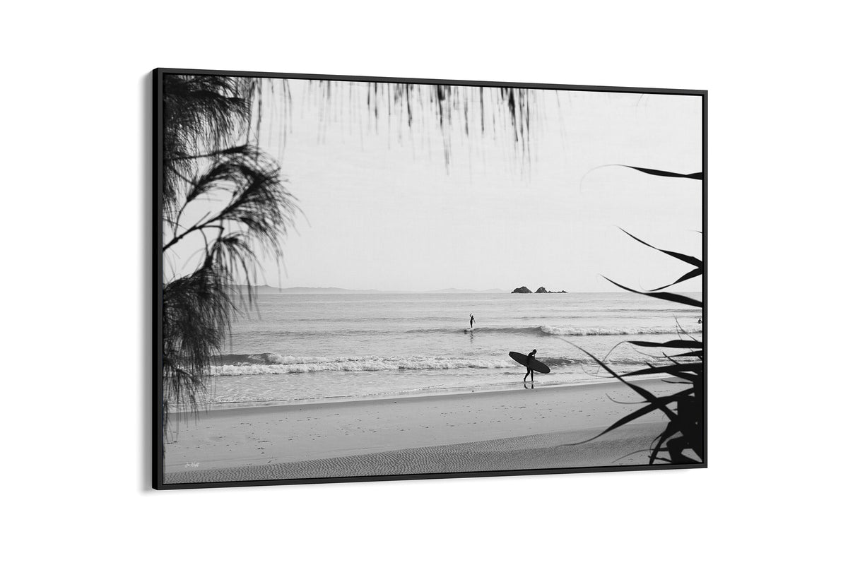 Byron Bay black and white surf print shown as a black float frame canvas.
