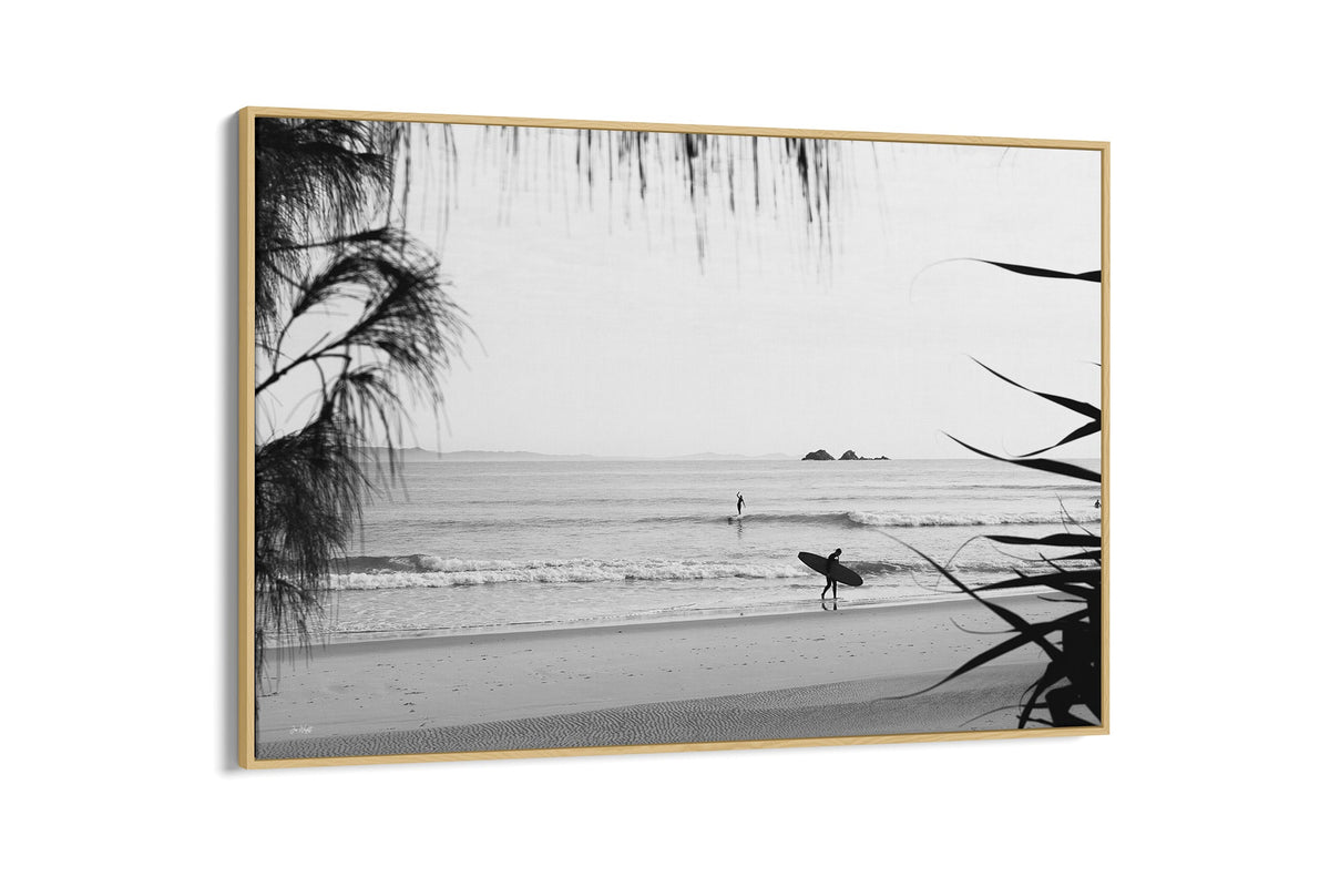 Byron Bay black and white surf print shown as an oak float frame canvas.