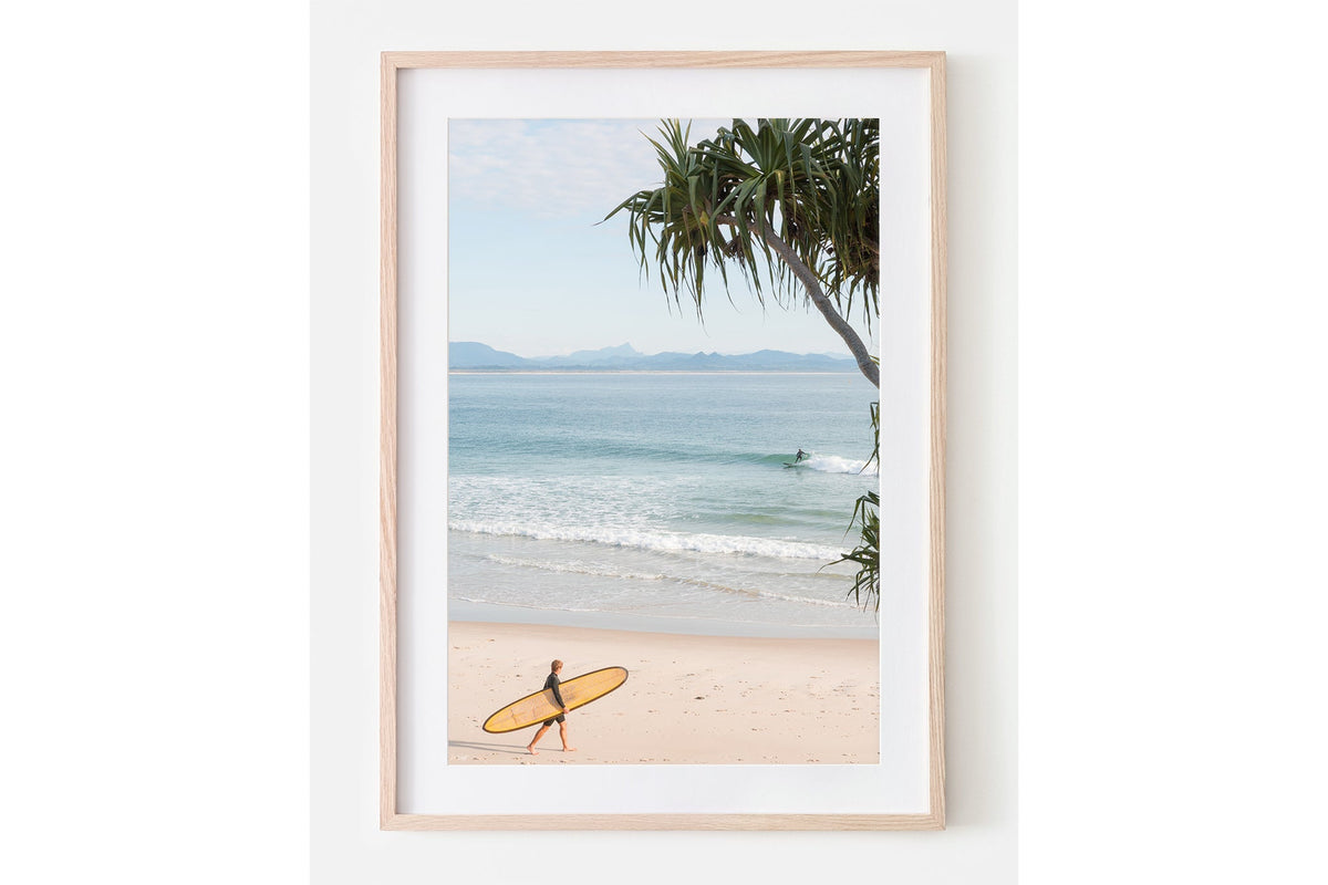 Yellow longboard Byron Bay print shown framed in oak with a white mat.