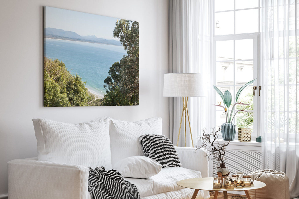 Byron Bay lookout print shown as a canvas in a white room.