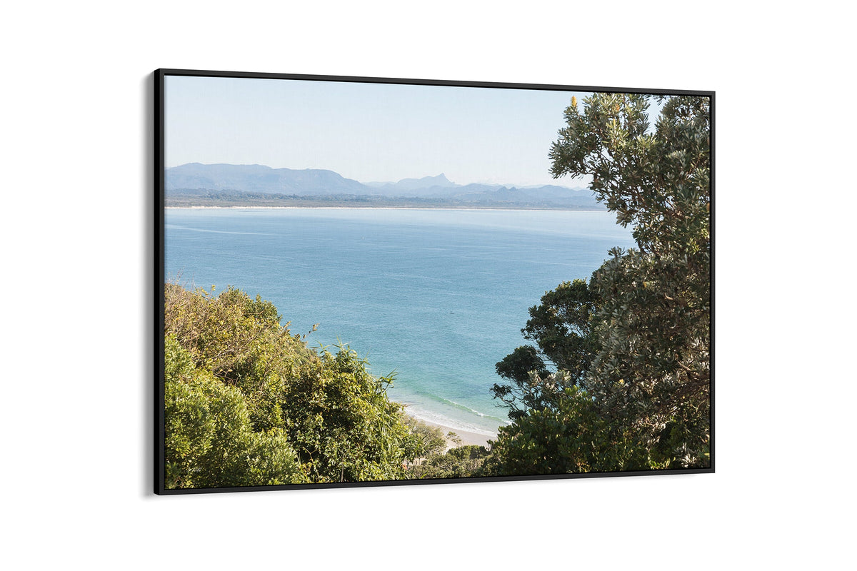 Byron Bay lookout print shown as a black float frame canvas.