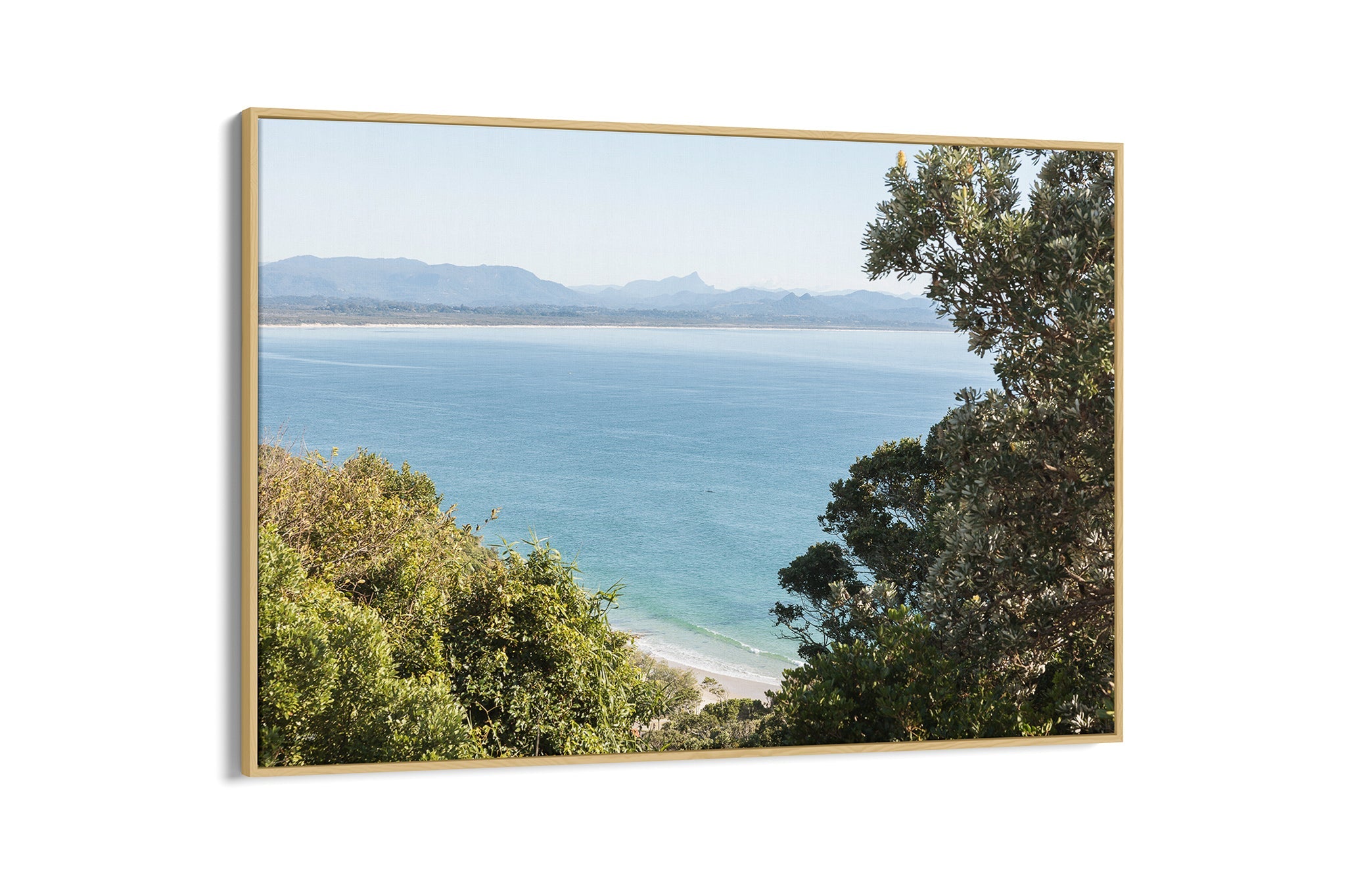 Byron Bay lookout print shown as an oak float frame canvas.