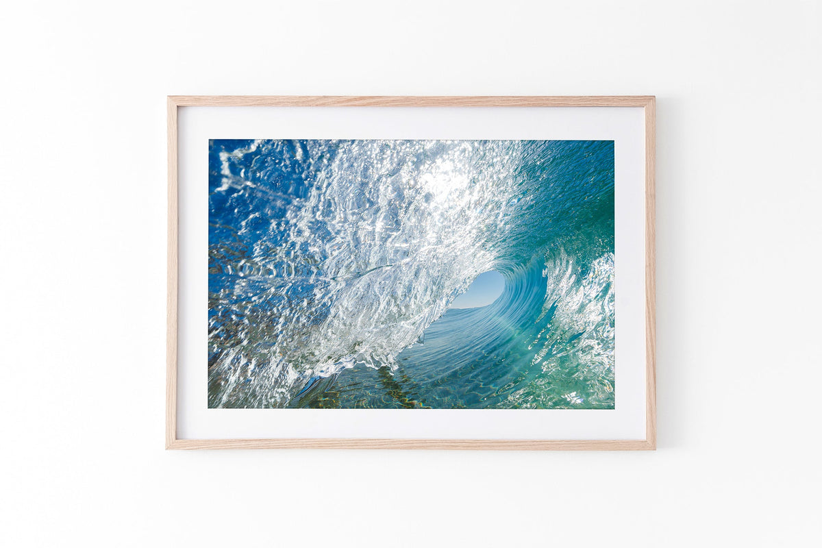 Glass Tunnel print shown framed in oak.