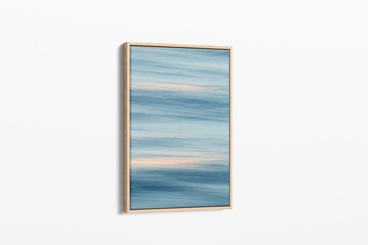 Soft Horizon print shown as a canvas in an oak float frame.