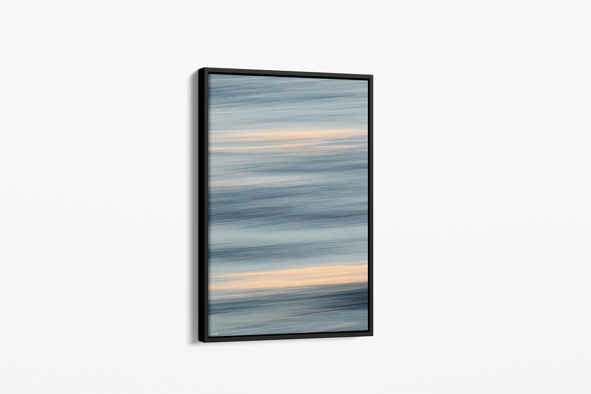 Quiet Tide print shown as a canvas in a black float frame.