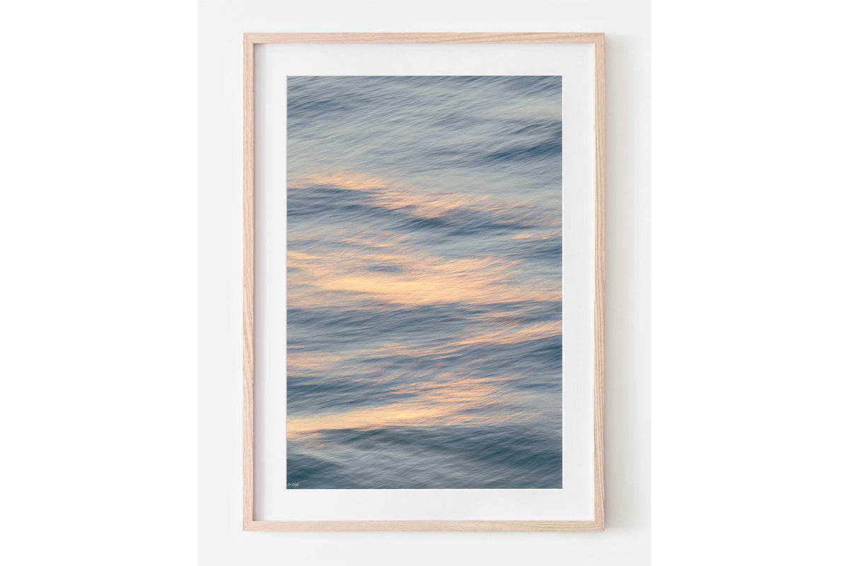 Peach Ripple print shown framed in oak with a white mat.