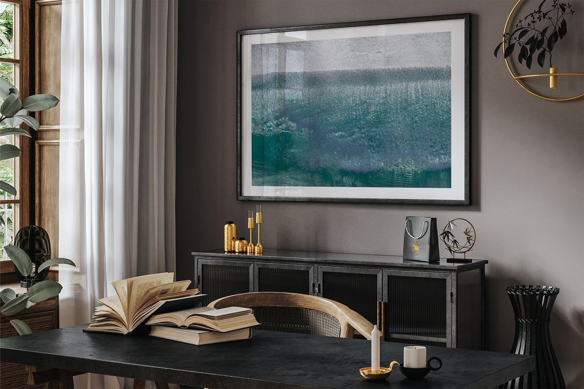 Jade Veil print shown framed in black in a dark room.