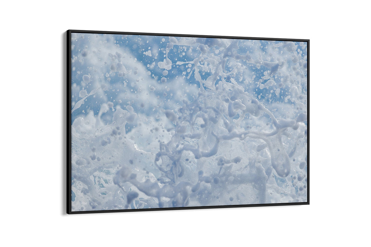 Frozen Splash print shown as a canvas in a black float frame.