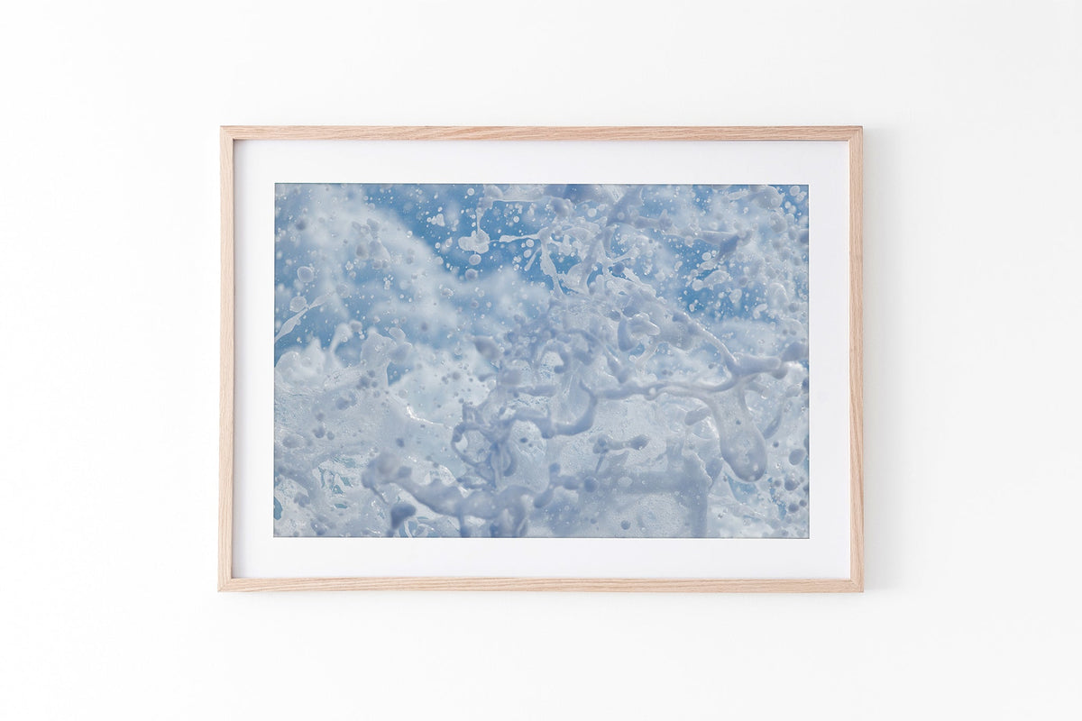 Frozen Splash print shown framed in oak.