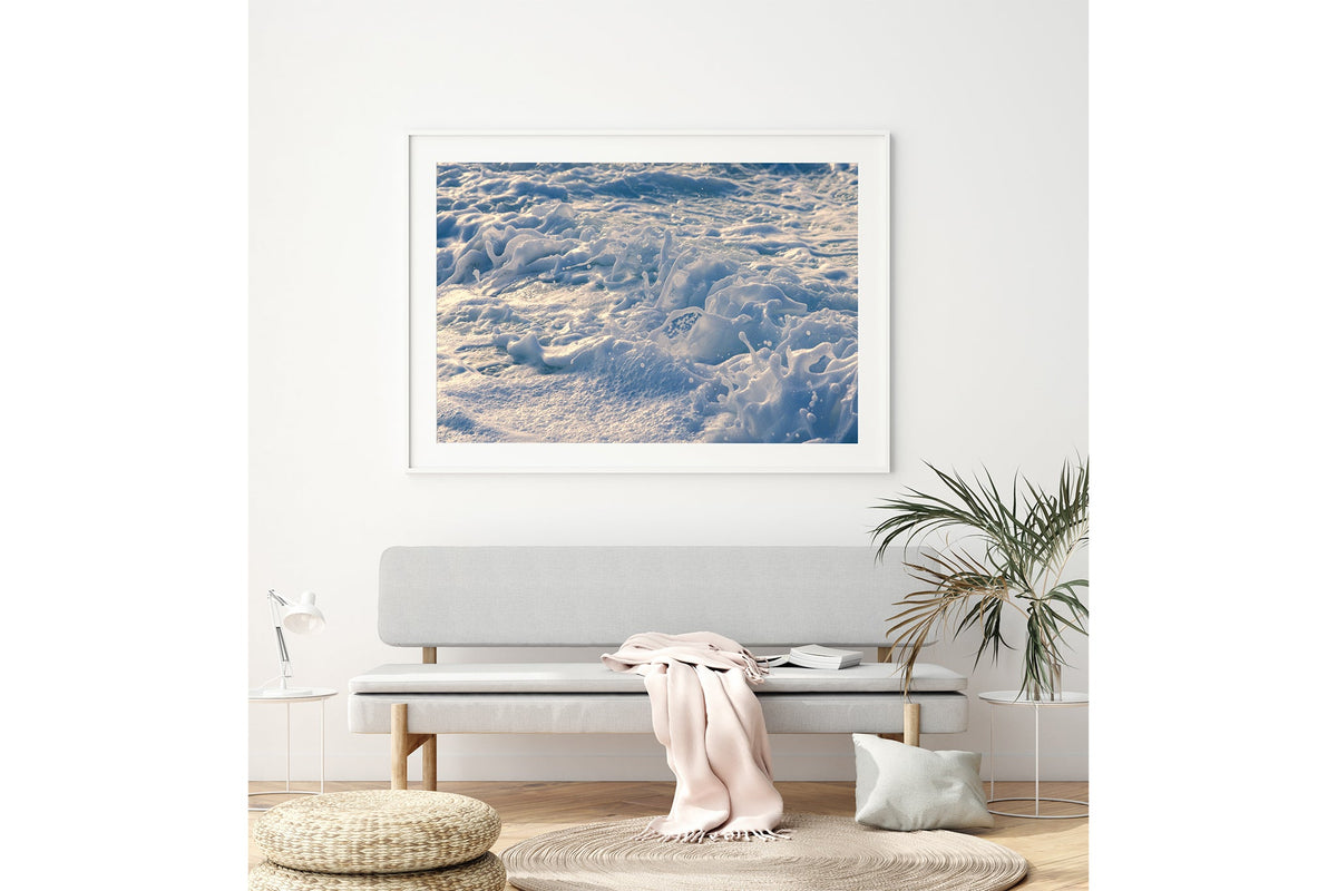 Frost Foam print shown framed in white above a bench seat.