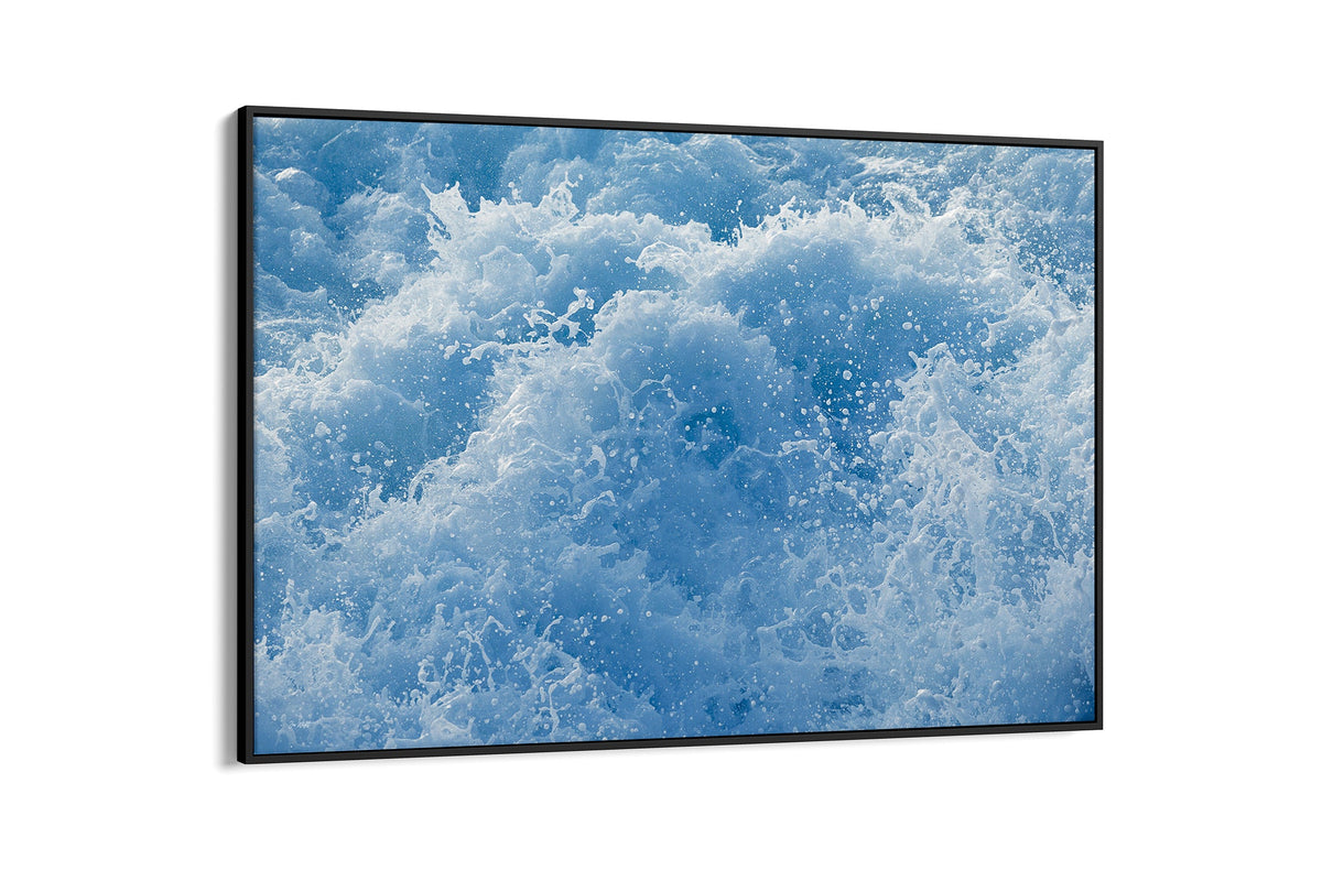 Cobalt Chaos print shown as a canvas in a black float frame.