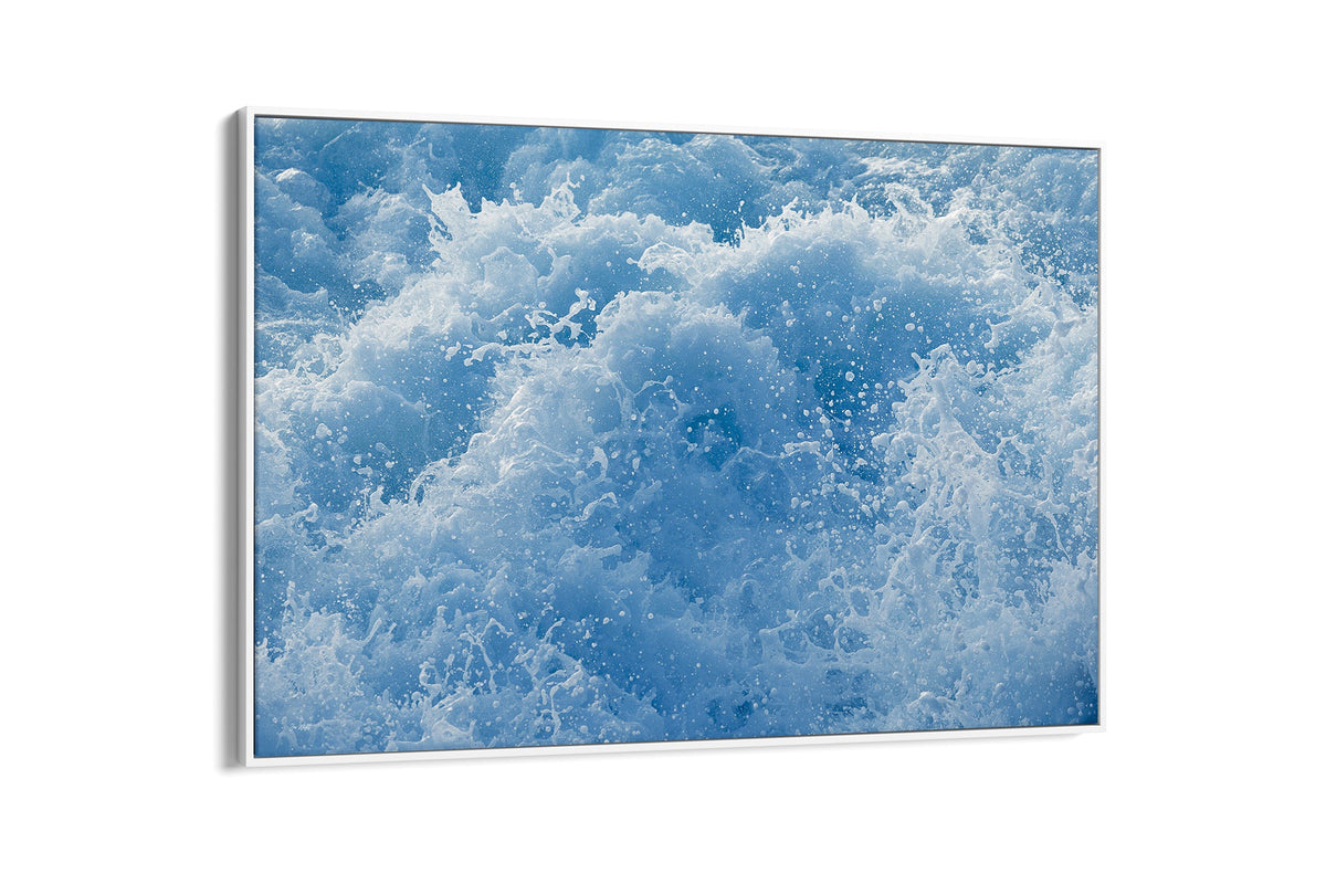Cobalt Chaos print shown as a canvas in a white float frame.