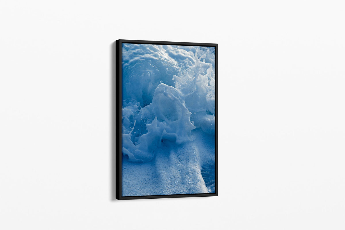 Ice Blue Foam print shown as a canvas in a black float frame.
