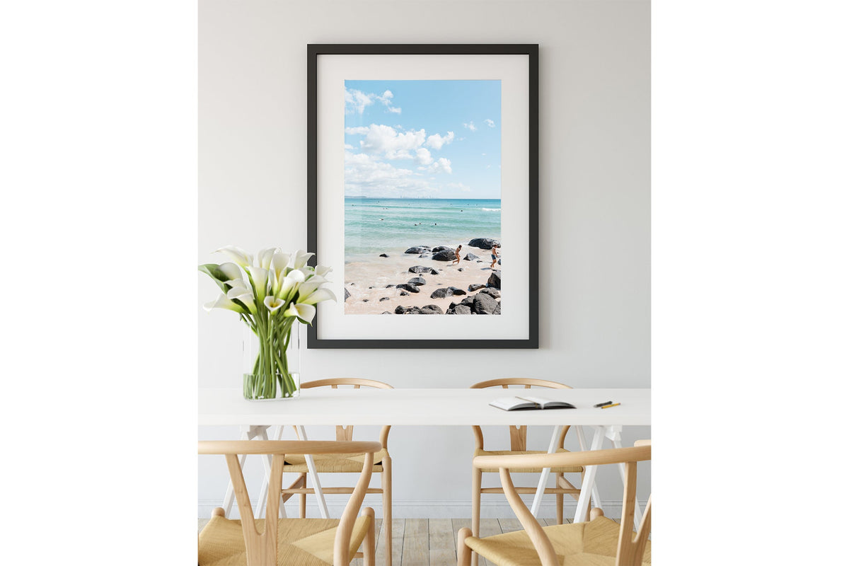 Rocky Shore Skyline print shown framed in black.