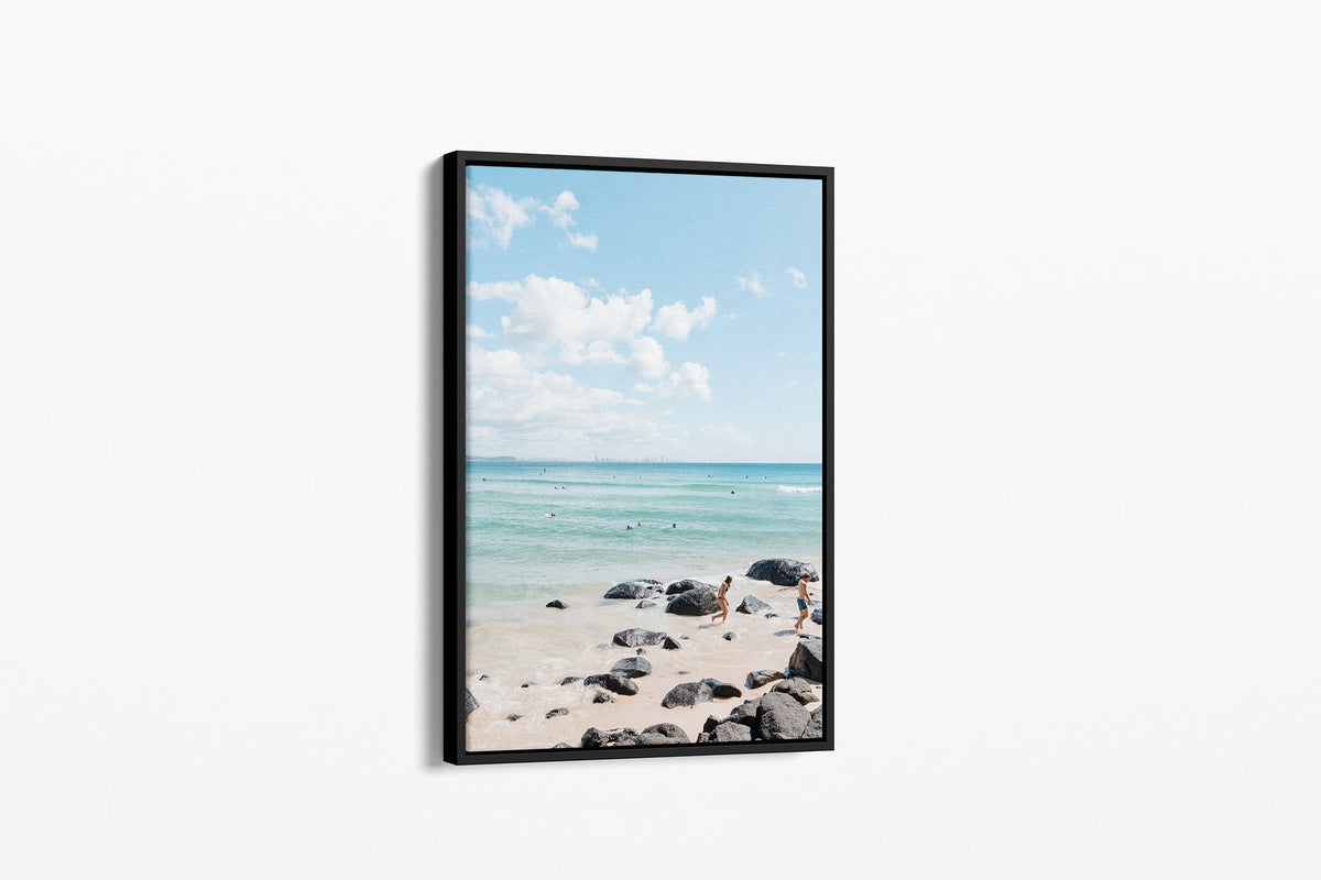 Rocky Shore Skyline print shown as a canvas in a black float frame.