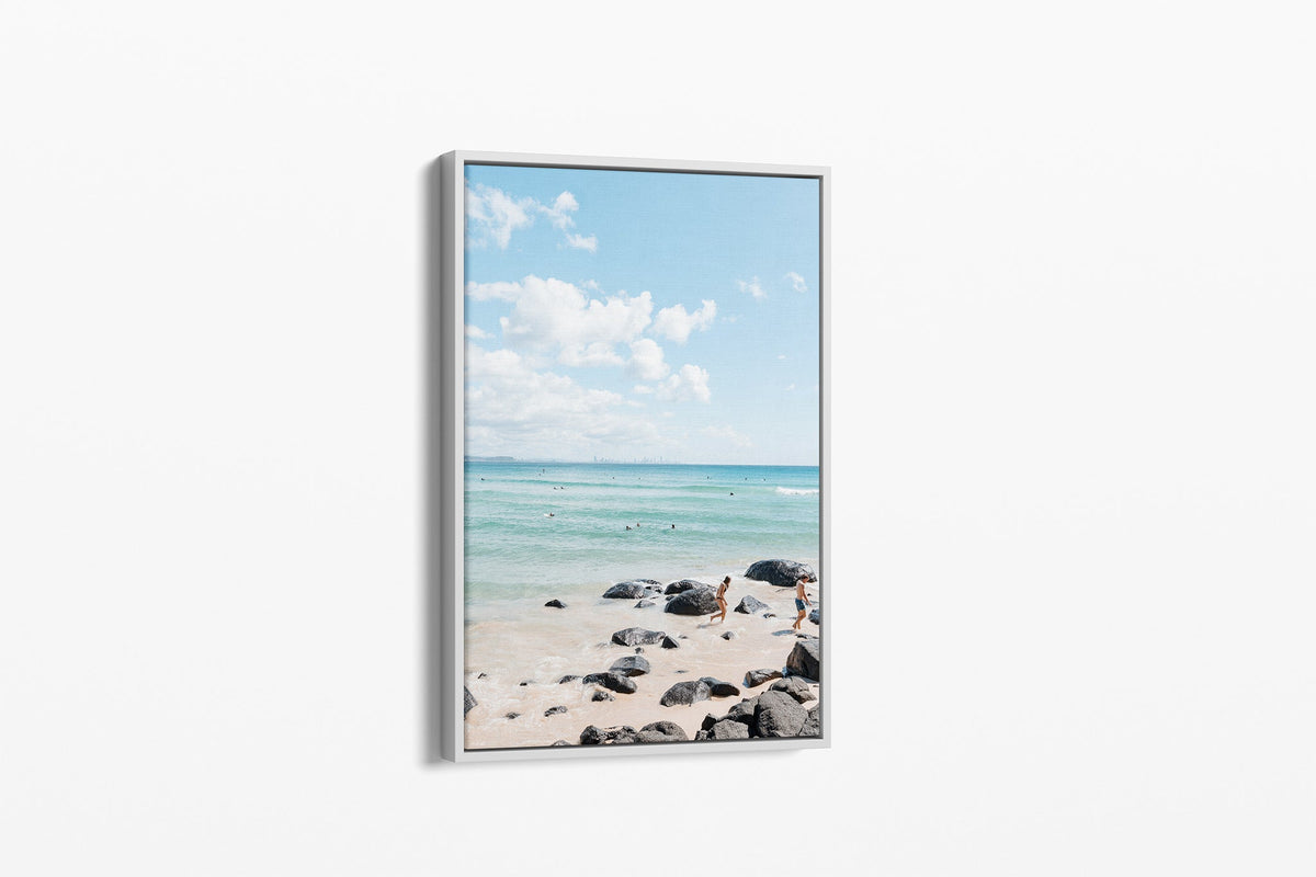 Rocky Shore Skyline print shown as a canvas in a white float frame.