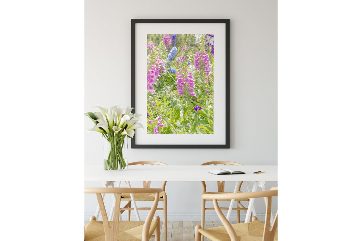 Foxglove and delphinium print shown framed in black.