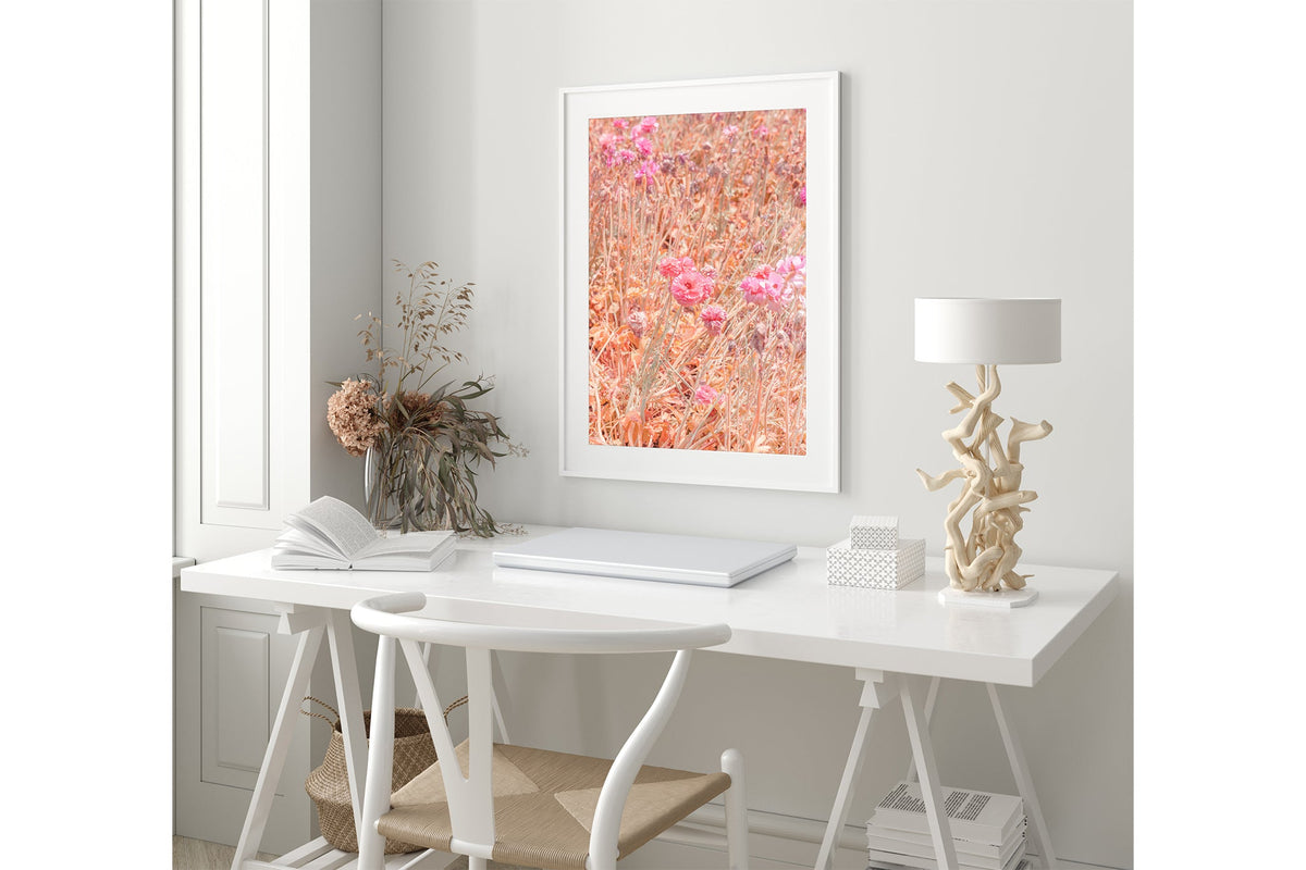 Faded ranunculus print shown framed in white.