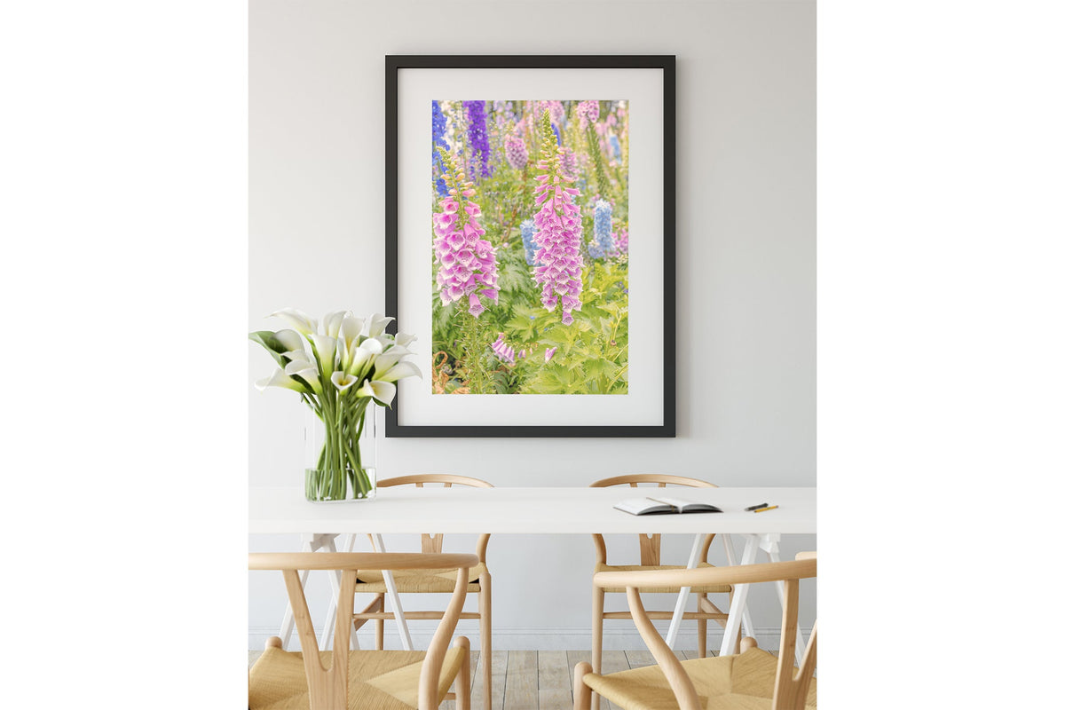Pastel foxglove print shown framed in black.