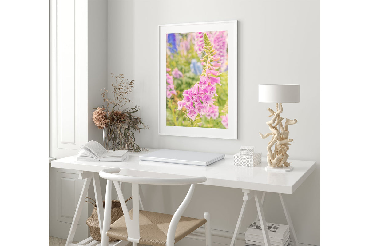 Cascading foxglove print shown framed in white.