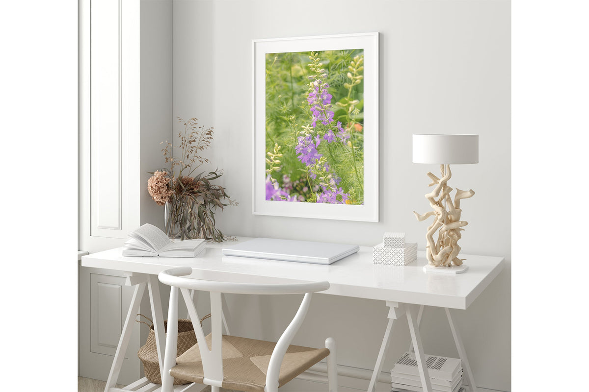 Lilac larkspur print shown framed in white.