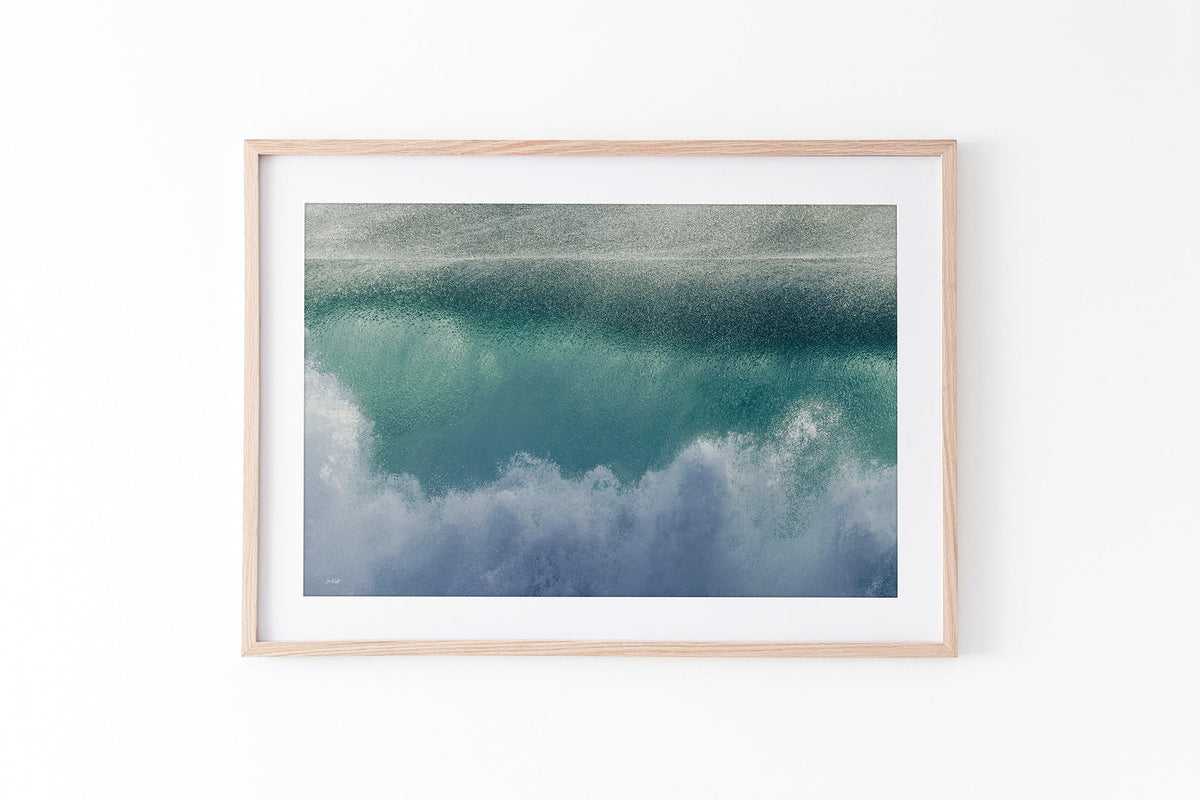 Aqua wave print shown framed in oak.