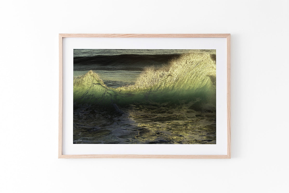 Emerald Crest print shown framed in oak.