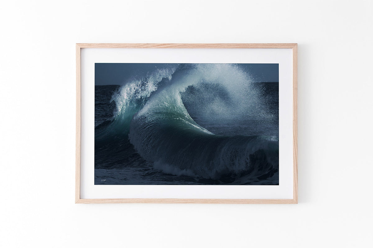 Rising Surge print shown framed in oak.