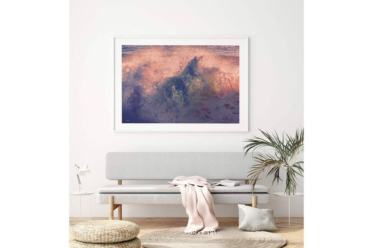 Dusk Burst print shown framed in white above a bench seat.