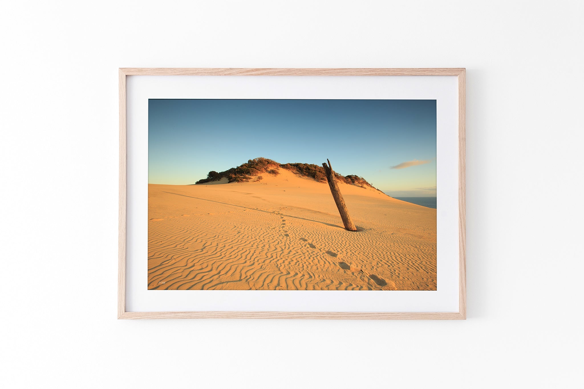 Rainbow Beach dune print shown framed in oak.