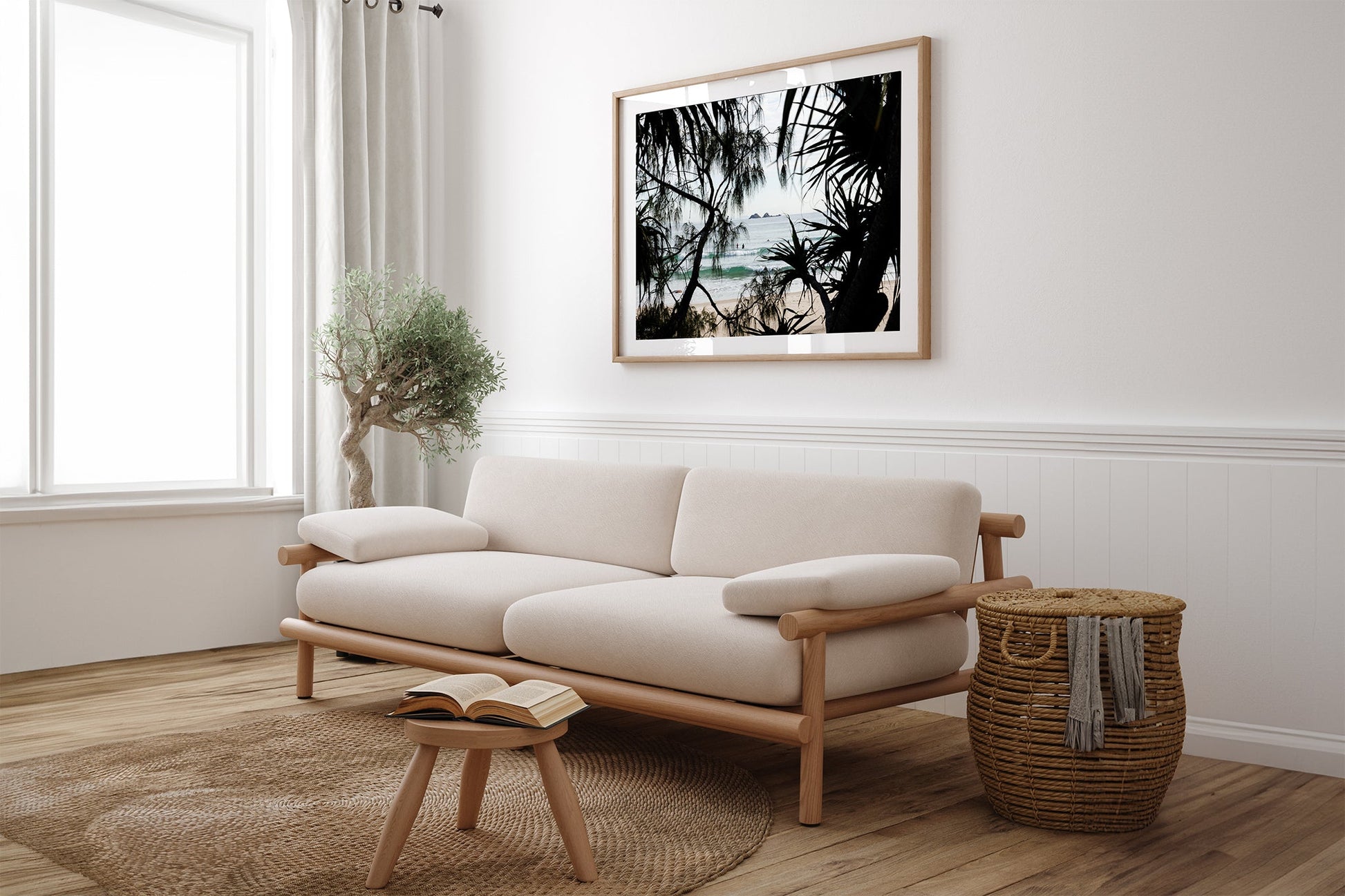 Framed Horizon print shown framed in oak above a couch.