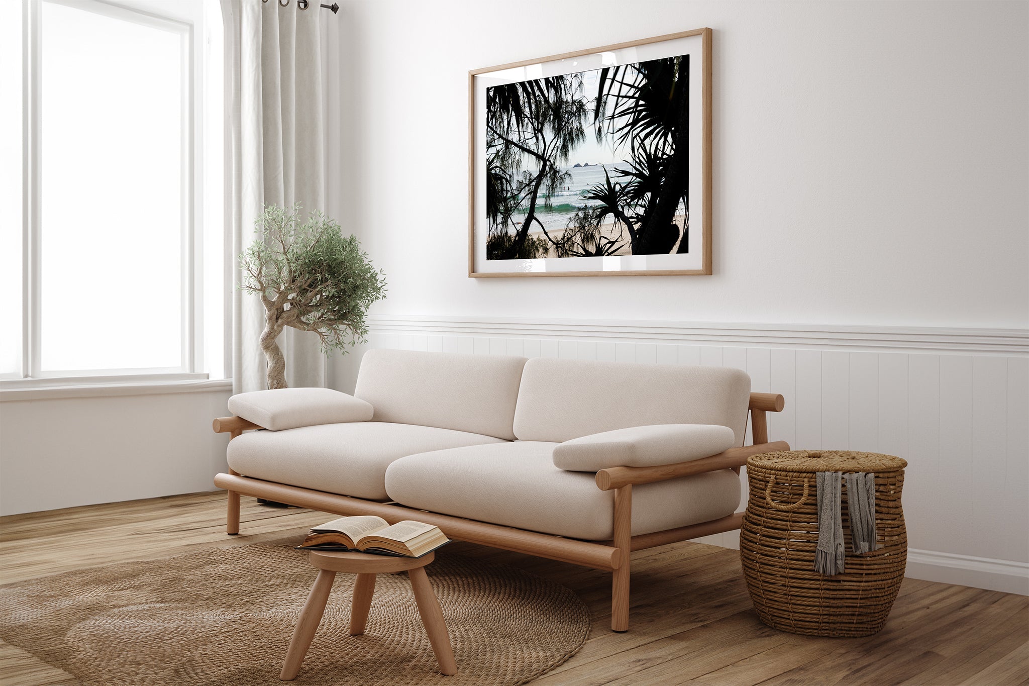 Framed Horizon print shown framed in oak above a couch.