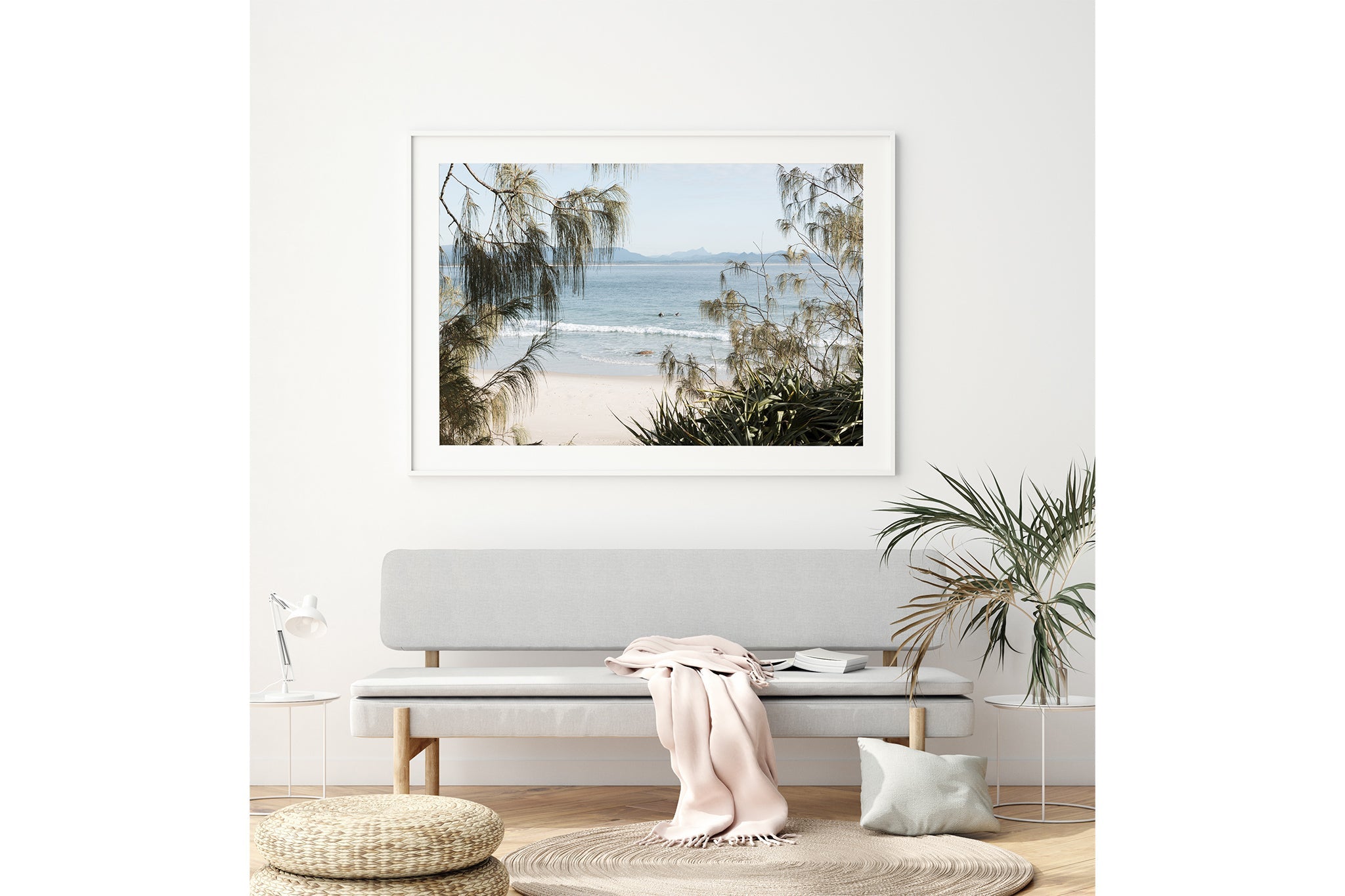 Hinterland Horizon print shown framed in white above a bench seat.