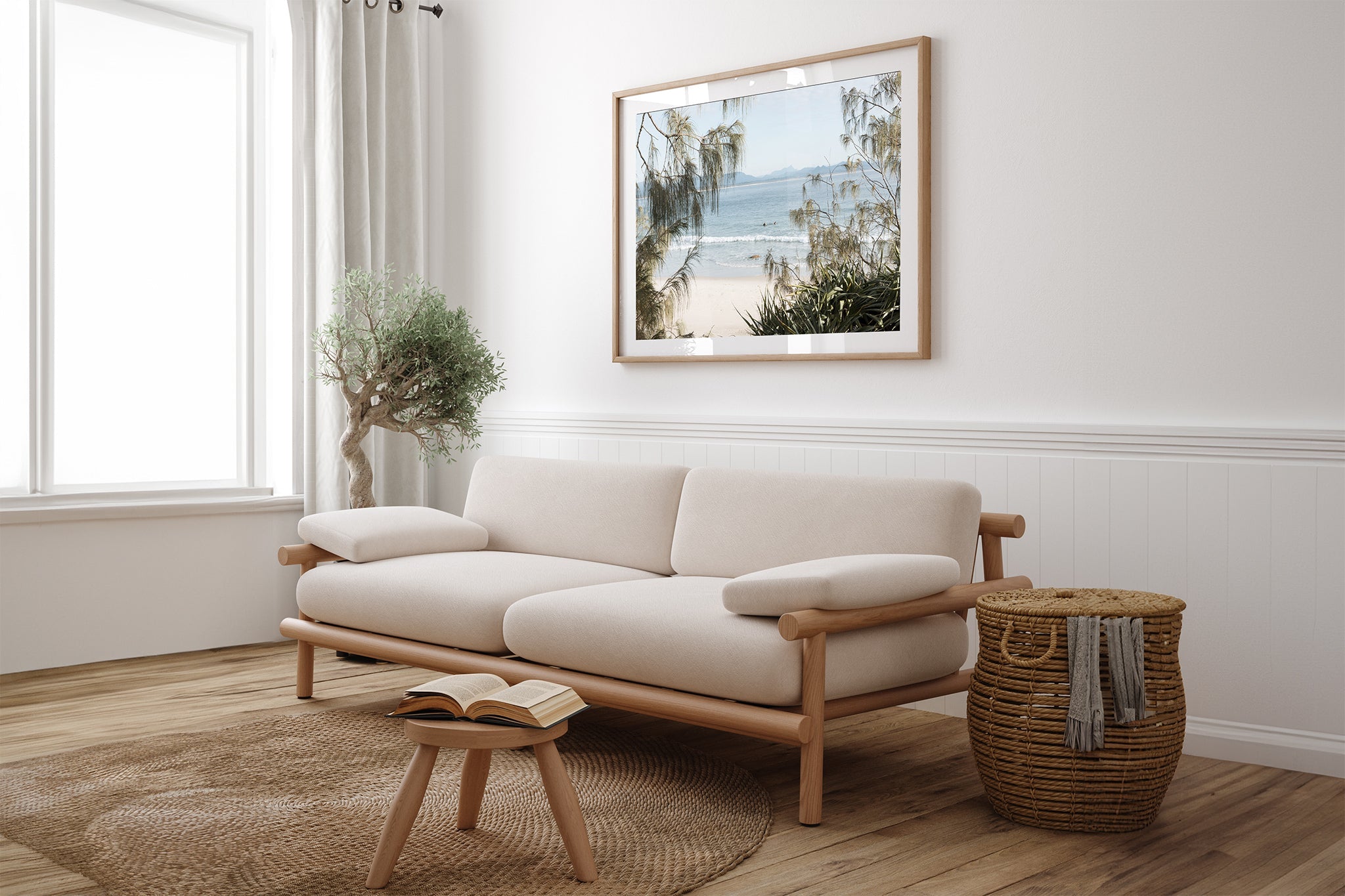 Hinterland Horizon print shown framed in oak above a couch.
