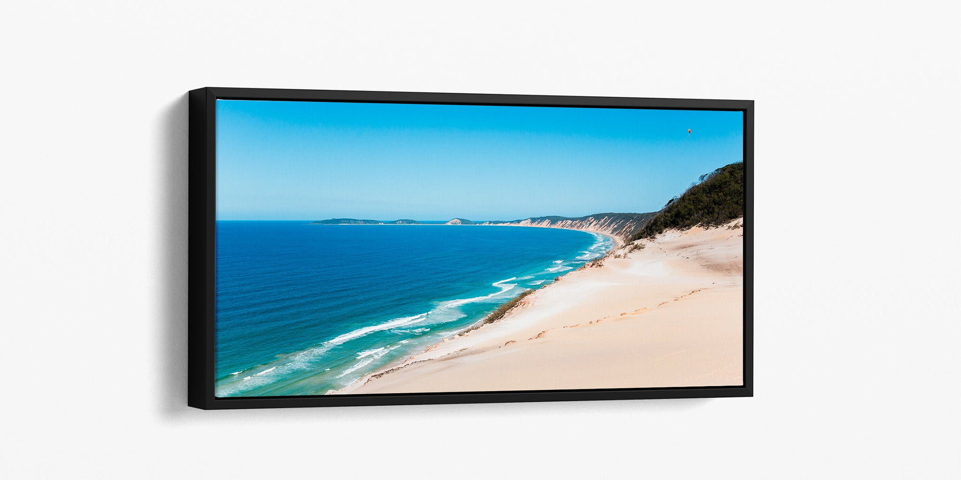 Rainbow Beach coloured sands print shown as a black float frame canvas.