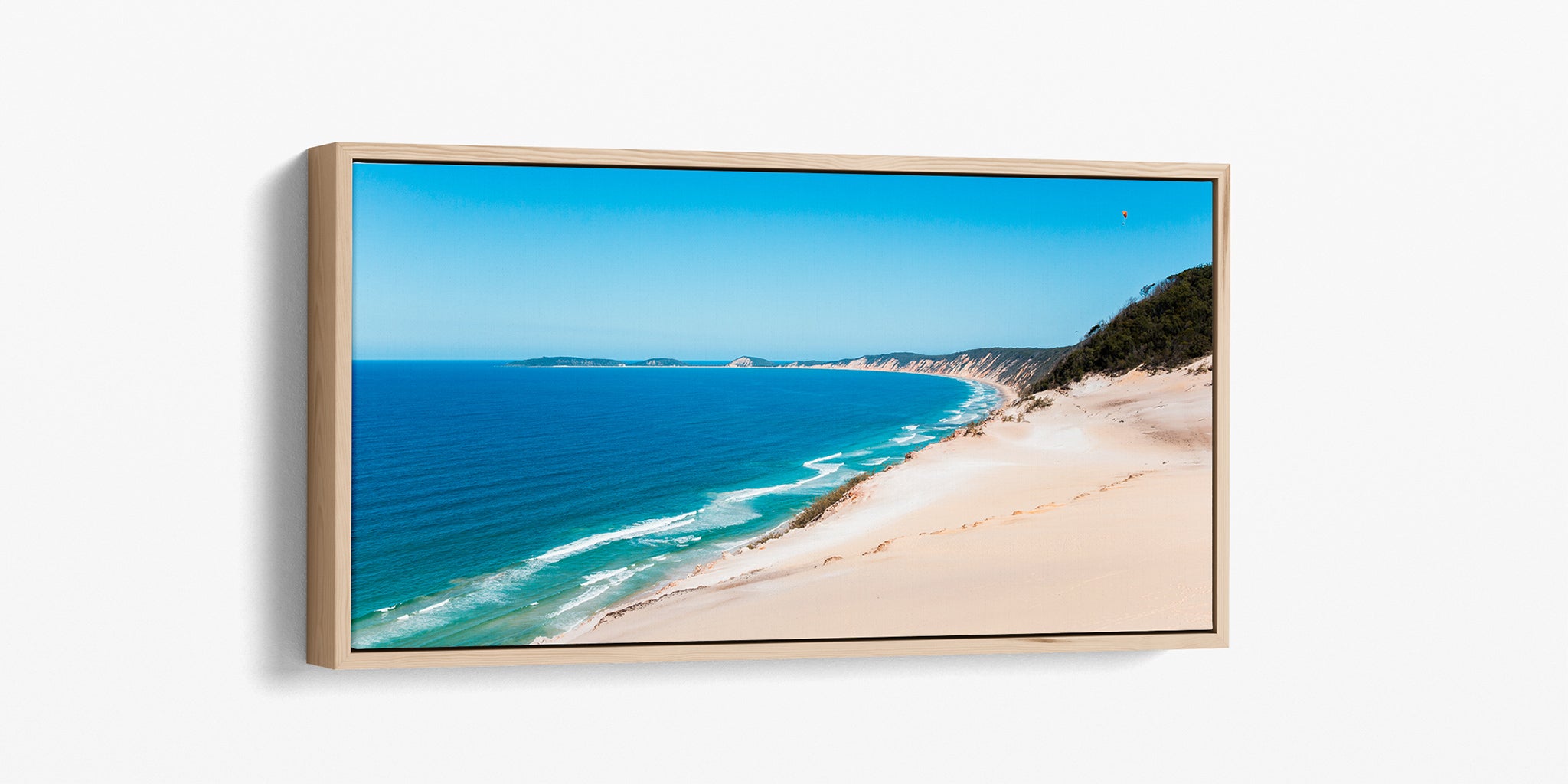 Rainbow Beach coloured sands print shown as an oak float frame canvas.