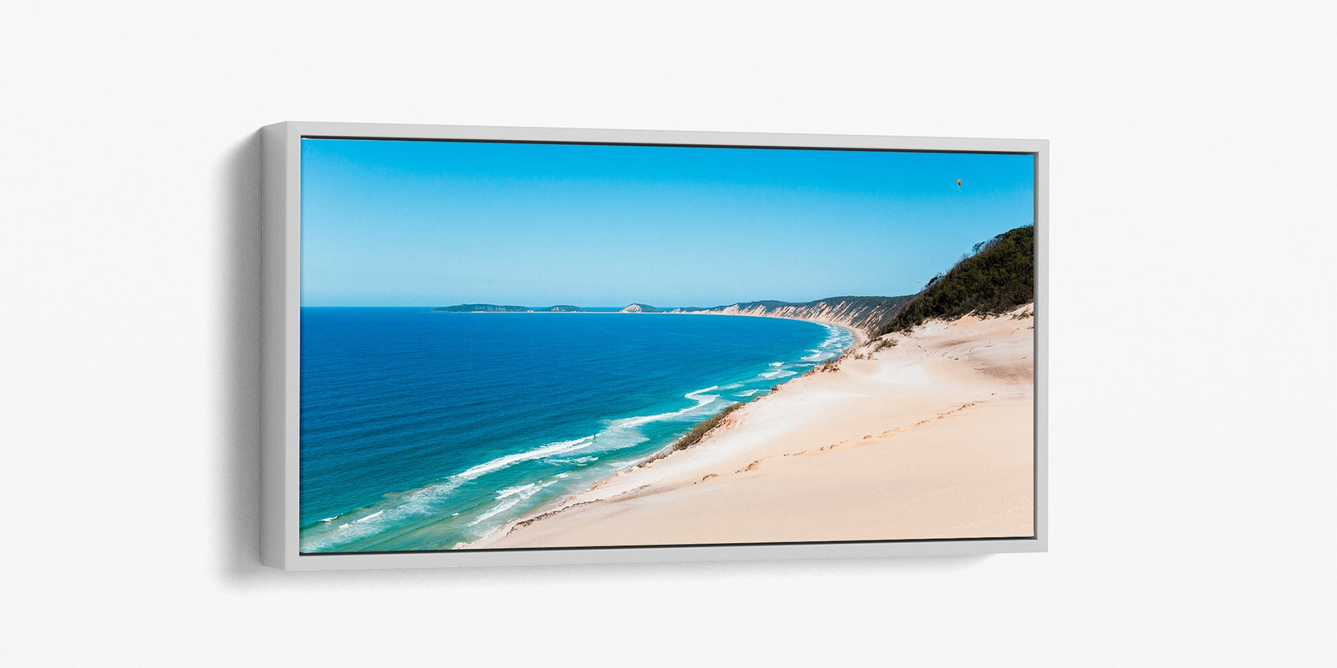 Rainbow Beach coloured sands print shown as a white float frame canvas.