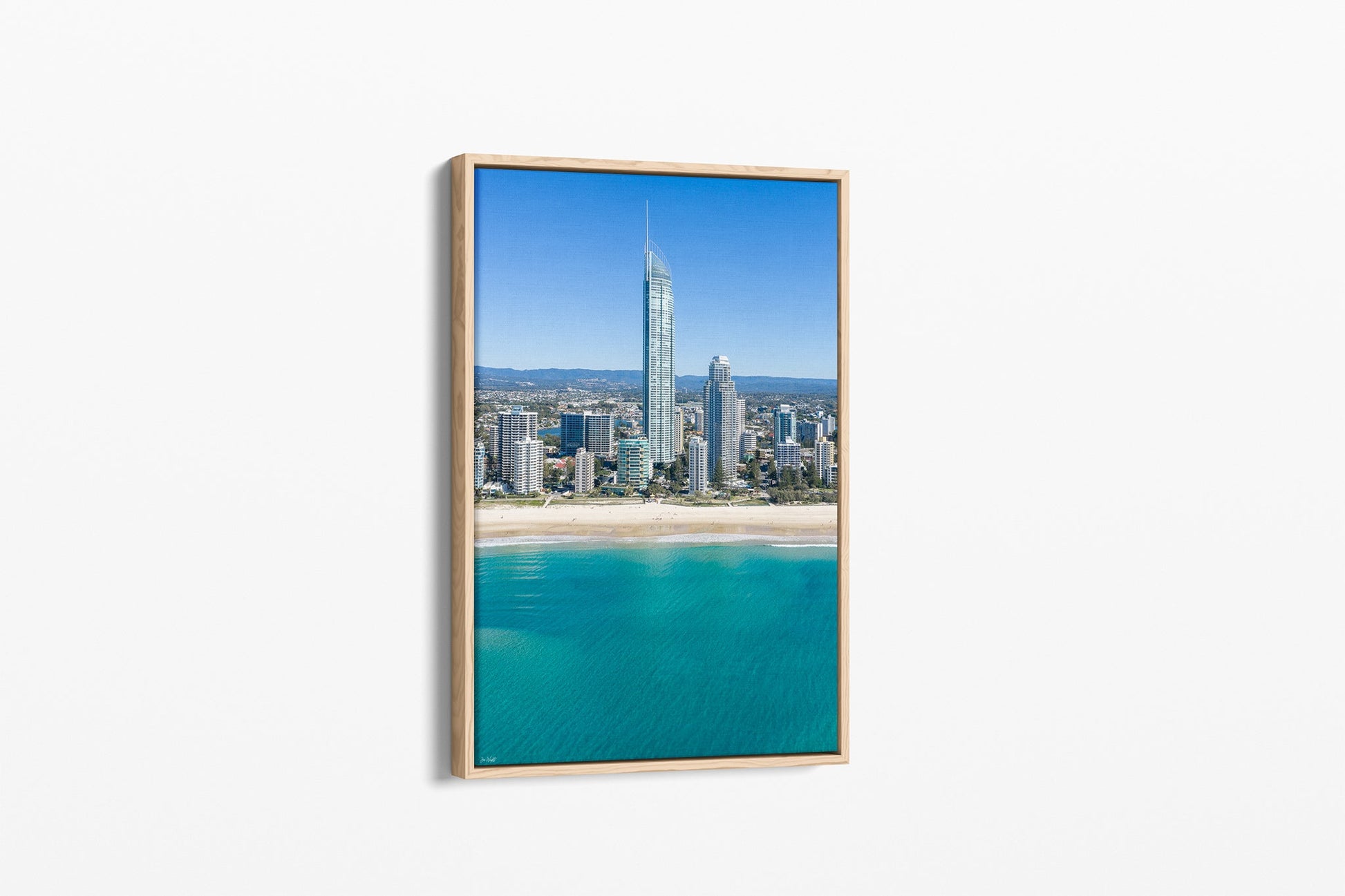 The Coastal Heights print shown as an oak float-frame canvas.