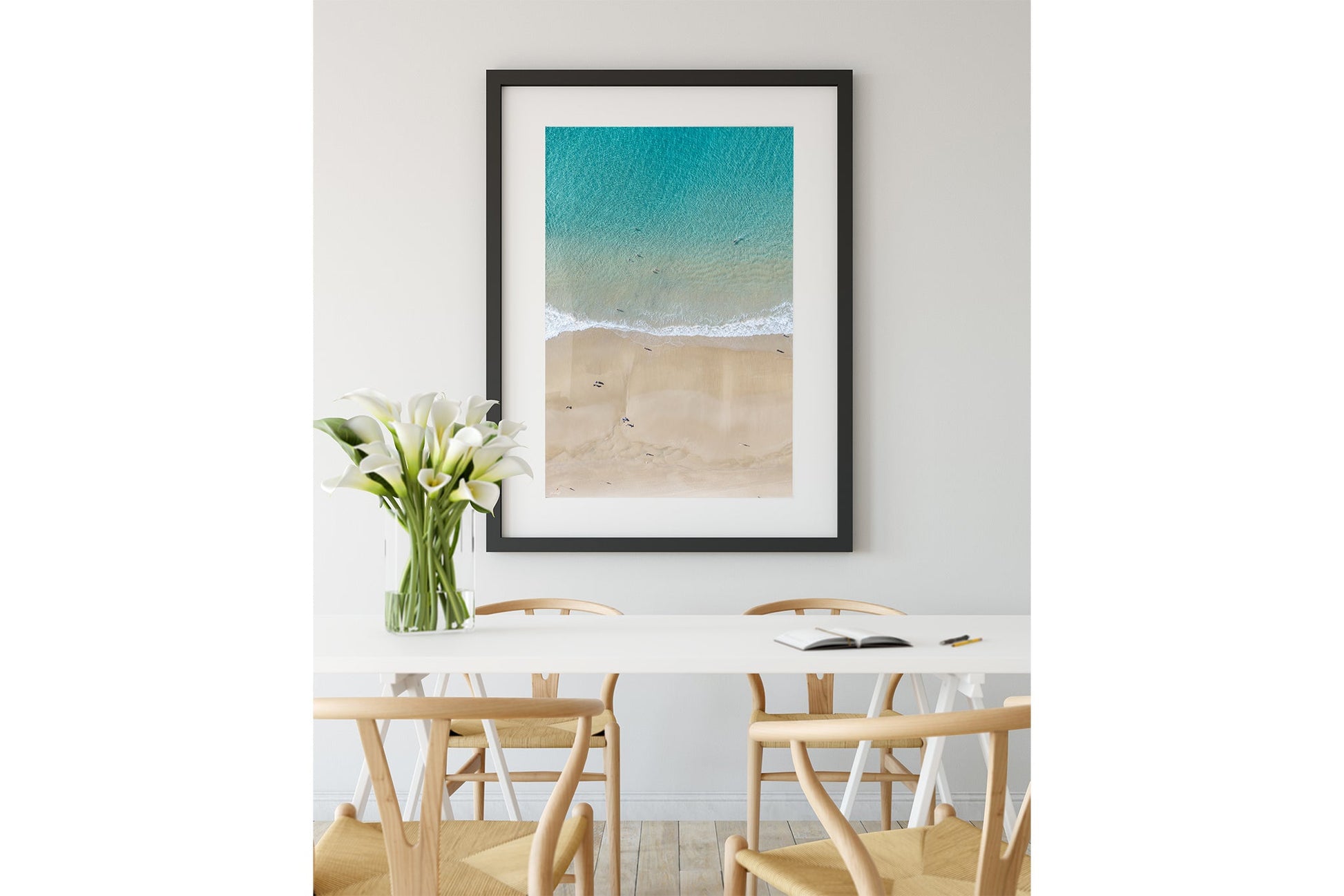 The Turquoise Shallows print shown framed in black.