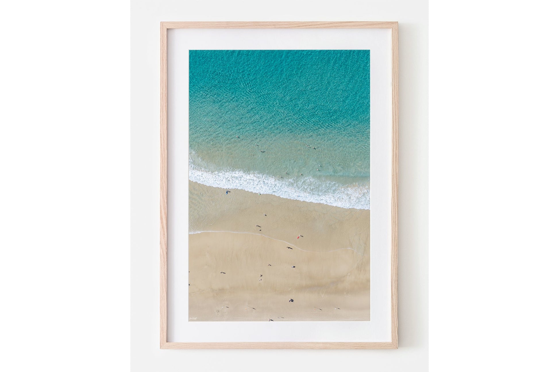 The Summer Shoreline print shown framed in oak.