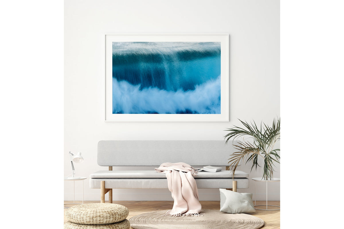 Deep Impact wave print shown framed in white above a bench seat.