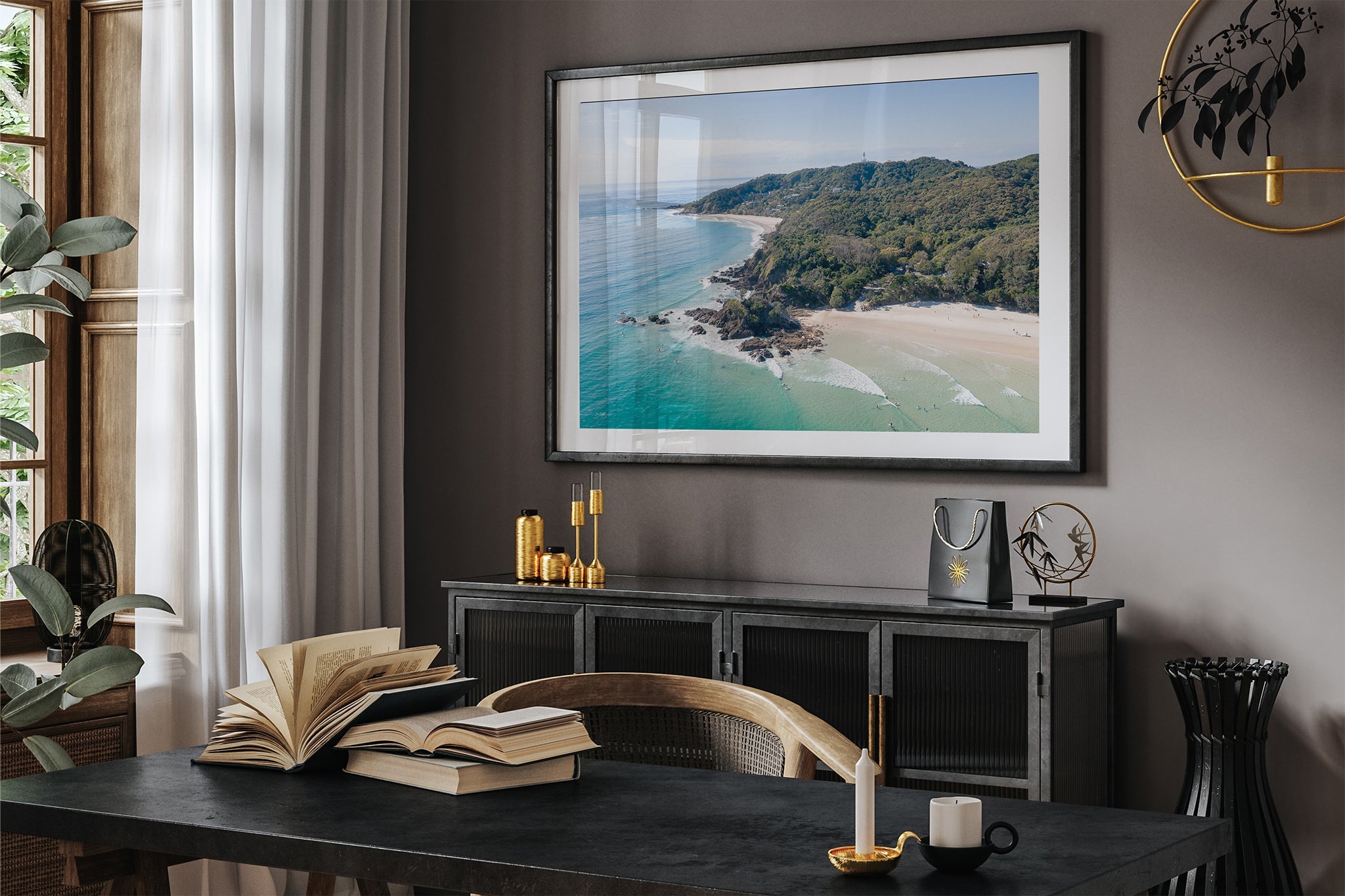 Lighthouse Point print shown framed in black in a dark toned room.