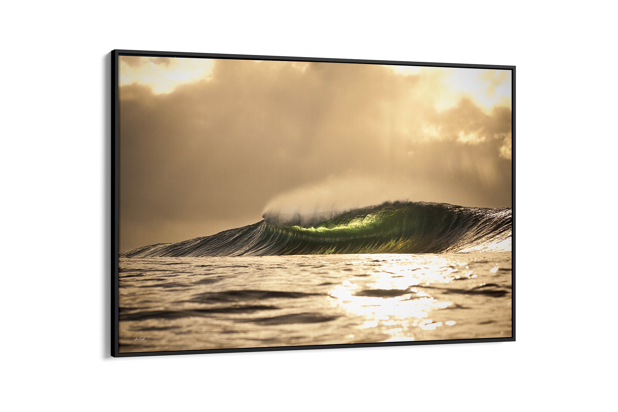 Golden sunset wave print shown as a canvas in a black float frame.