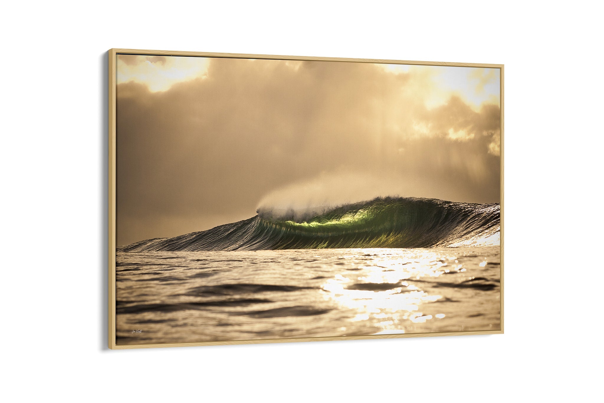 Golden sunset wave print shown as a canvas in an oak float frame.